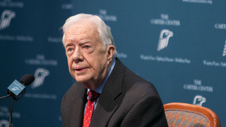 Ex-president and nice man Jimmy Carter shakes every damn hand on an airplane